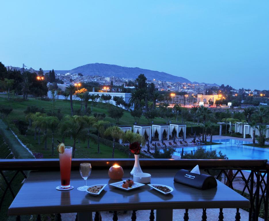 Palais Medina Riad Resort Fes Exterior photo View of the Atlas Mountains from the hotel